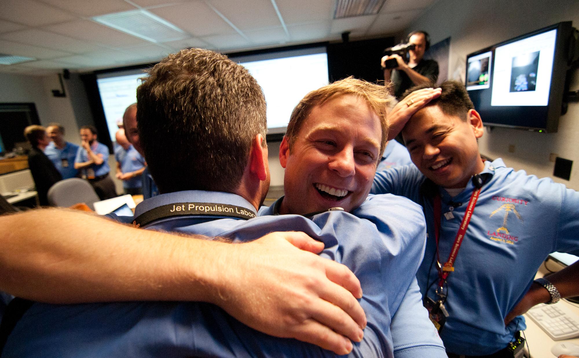 The Entry, Descent and Landing team celebrate just moments after news that Curiosity landed safely on Mars.