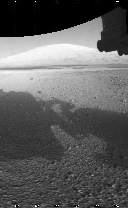 The Curiosity engineering team created this view from images taken by NASA's Curiosity rover front hazard avoidance cameras underneath the rover deck on Sol 0.