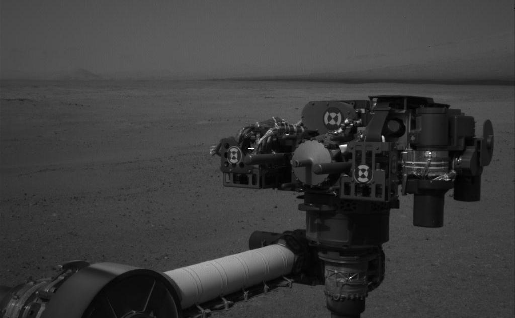 This full-resolution image from NASA's Curiosity shows the turret of tools at the end of the rover's extended robotic arm on Aug. 20, 2012. The Navigation Camera captured this view.