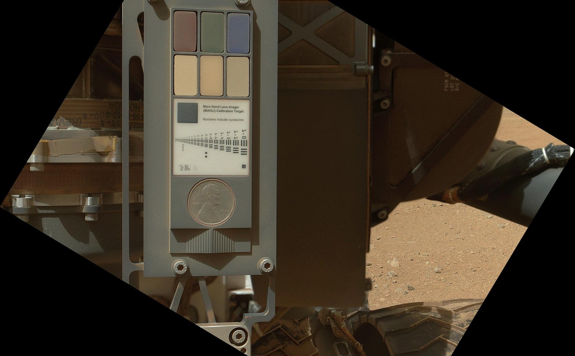 This view of the calibration target for the Mars Hand  Lens Imager (MAHLI) aboard NASA's Mars rover Curiosity combines two images taken by that camera during the 34th Martian day, or sol, of Curiosity's work on Mars (Sept. 9, 2012).