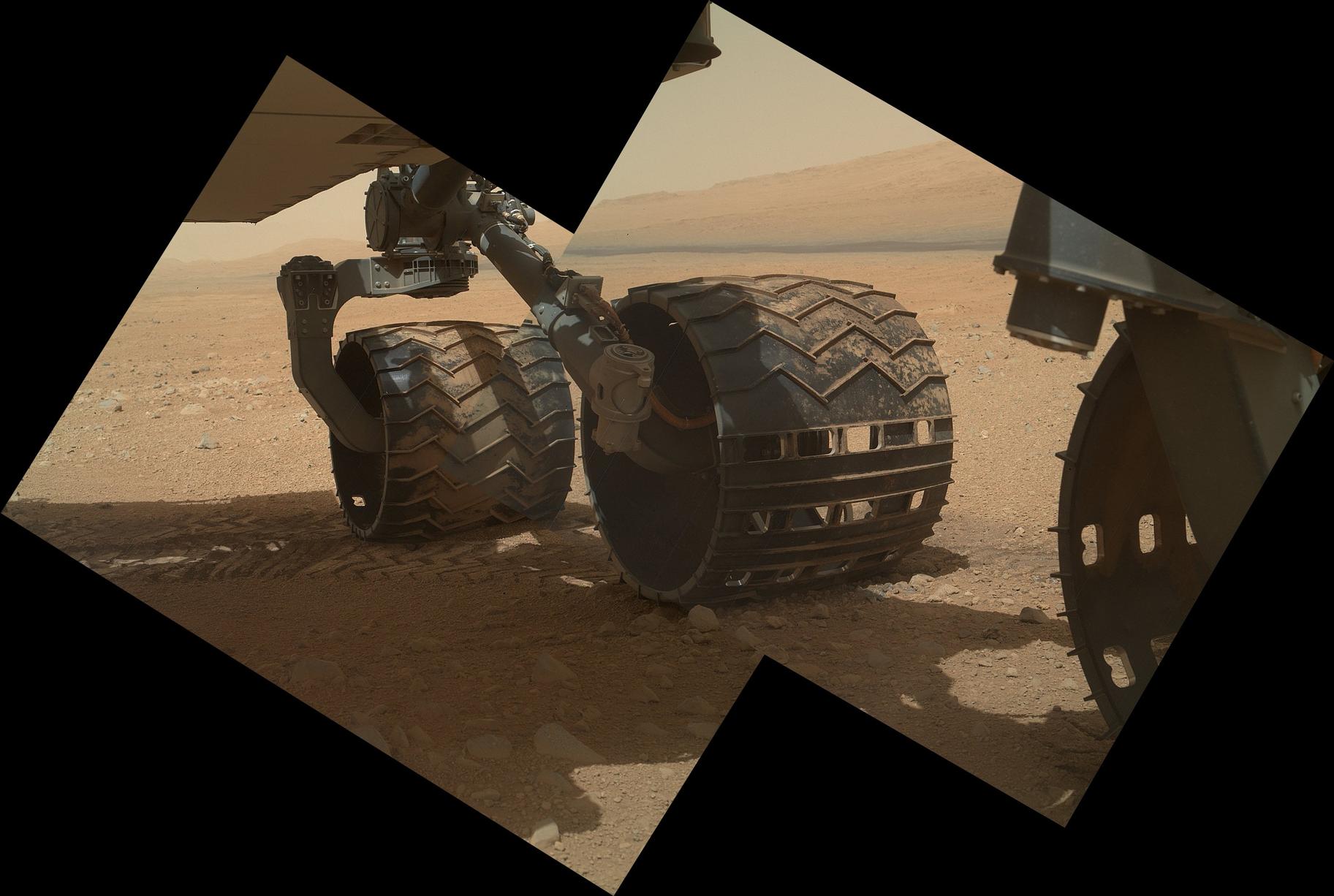 This view of the three left wheels of NASA's Mars rover Curiosity combines two images that were taken by the rover's Mars Hand Lens Imager (MAHLI) during the 34th Martian day, or sol, of Curiosity's work on Mars (Sept. 9, 2012).