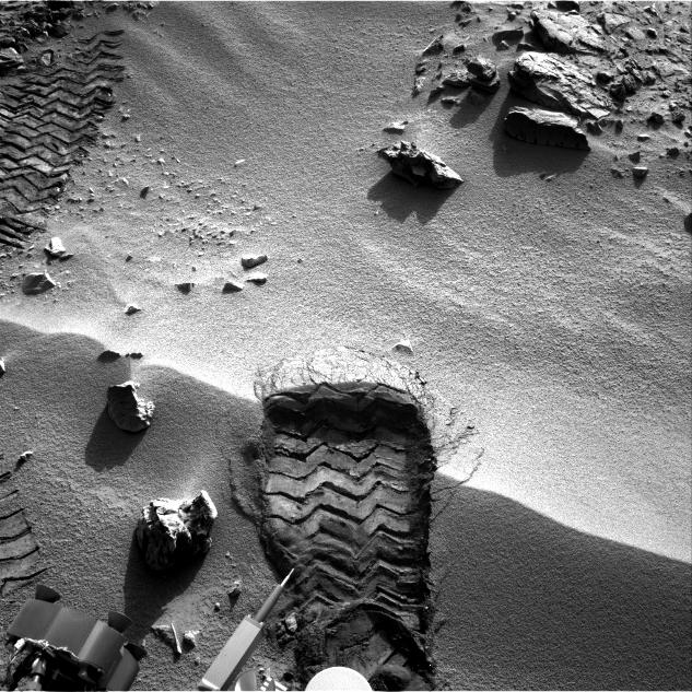 NASA's Mars rover Curiosity cut a wheel scuff mark into a wind-formed ripple at the "Rocknest" site to give researchers a better opportunity to examine the particle-size distribution of the material forming the ripple.