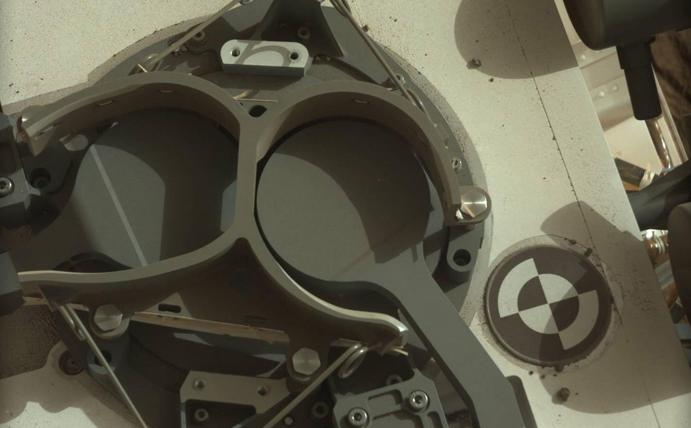 This subframe image from the left Mast Camera (Mastcam) on NASA's Mars rover Curiosity shows the covers in place over two sample inlet funnels of the rover's Sample Analysis at Mars (SAM) instrument suite.