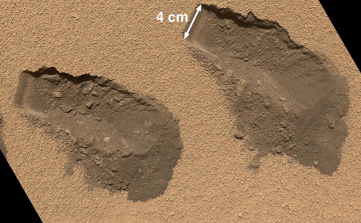 This is a view of the third (left) and fourth (right) trenches made by the 1.6-inch-wide (4-centimeter-wide) scoop on NASA's Mars rover Curiosity in October 2012.