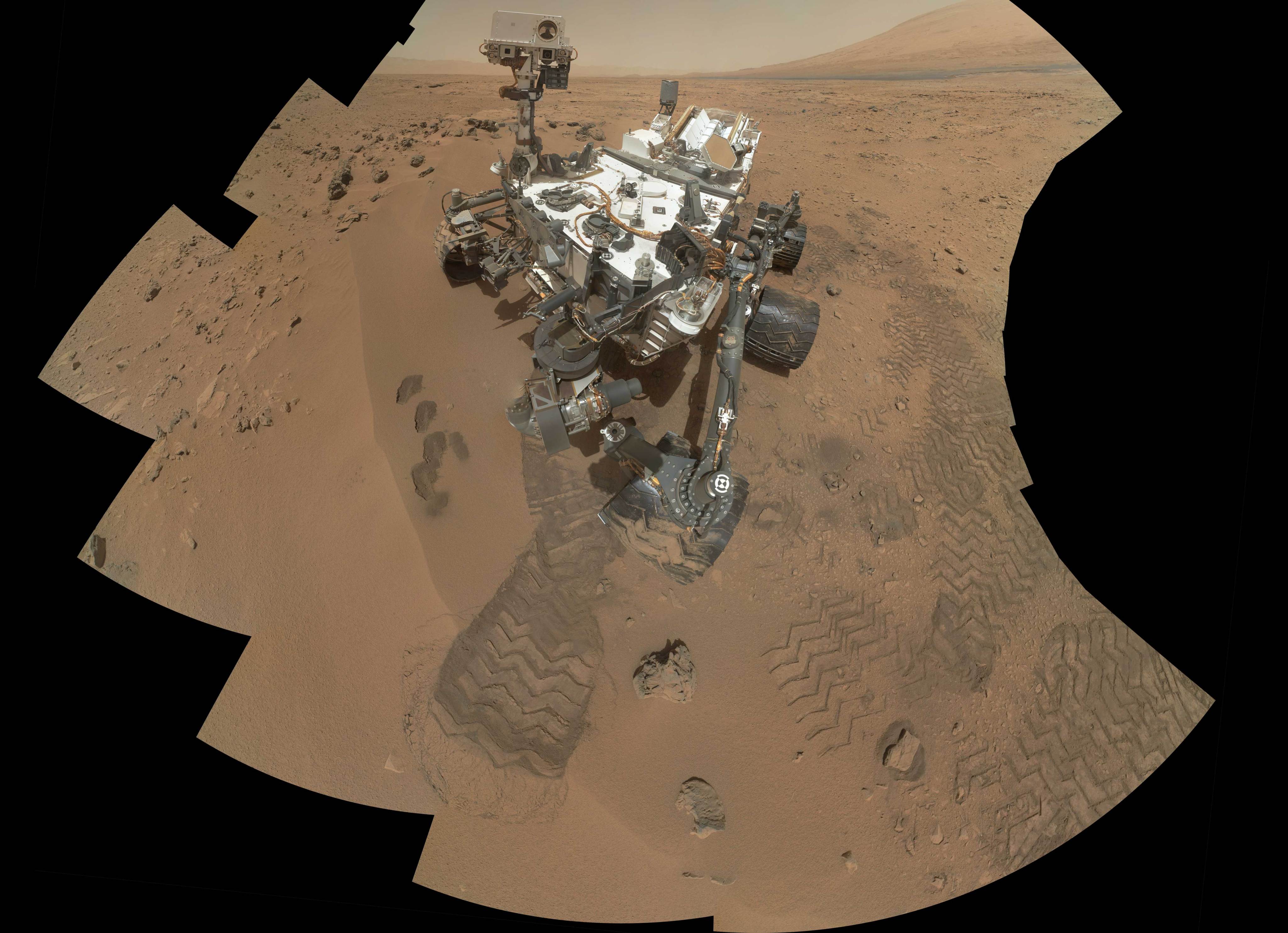 NASA's Curiosity Mars rover documented itself in the context of its work site, an area called "Rocknest Wind Drift," on the 84th Martian day, or sol, of its mission (Oct. 31, 2012).