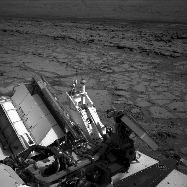 The NASA Mars rover Curiosity used its left Navigation Camera to record this view of the step down into a shallow depression called "Yellowknife Bay."