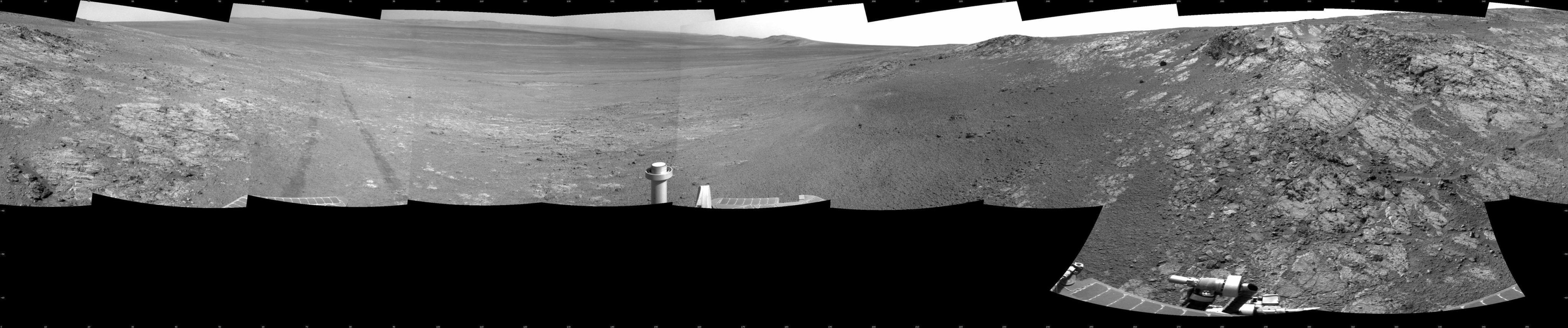 This full-circle panorama shows the terrain around the NASA Mars Exploration Rover Opportunity during the 3,105th Martian day, or sol, of the rover's work on Mars (Oct. 18, 2012).