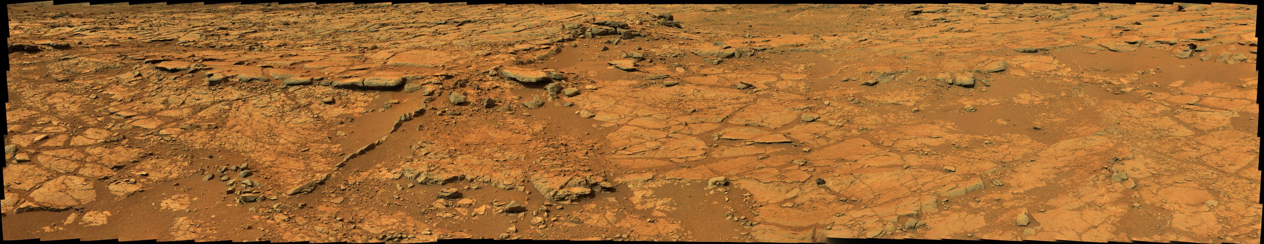 From a position in the shallow "Yellowknife Bay" depression, NASA's Mars rover Curiosity used its right Mast Camera (Mastcam) to take the telephoto images combined into this panorama of geological diversity.