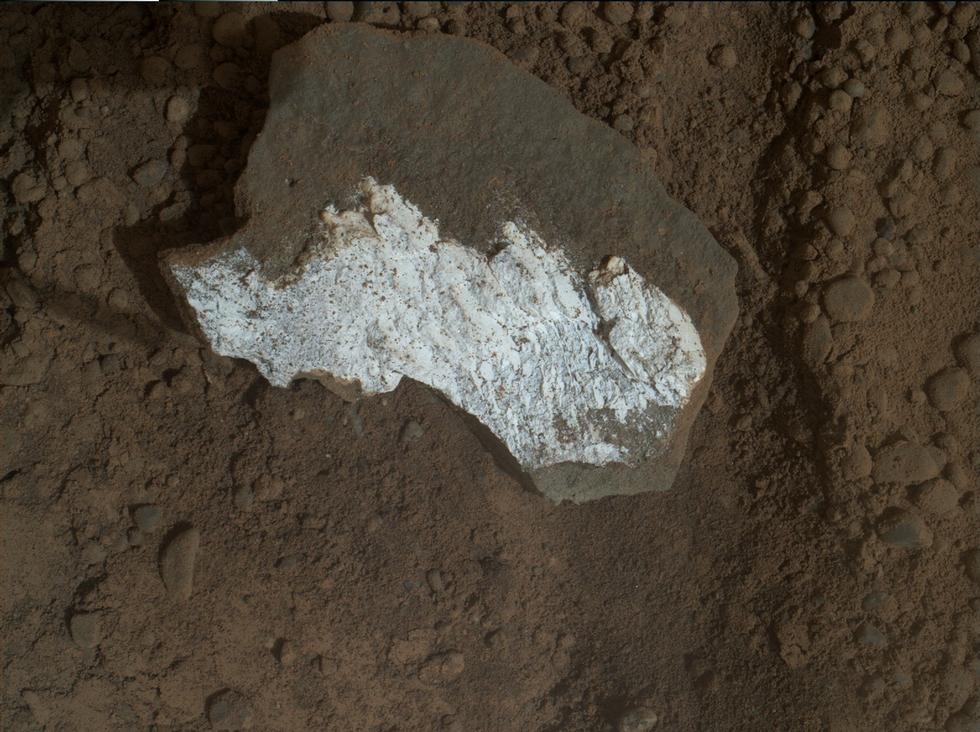 This close-up view of "Tintina" was taken by the rover's Mars Hand Lens Imager (MAHLI) on Sol 160 (Jan. 17, 2013) and shows interesting linear textures in the bright white material on the rock.