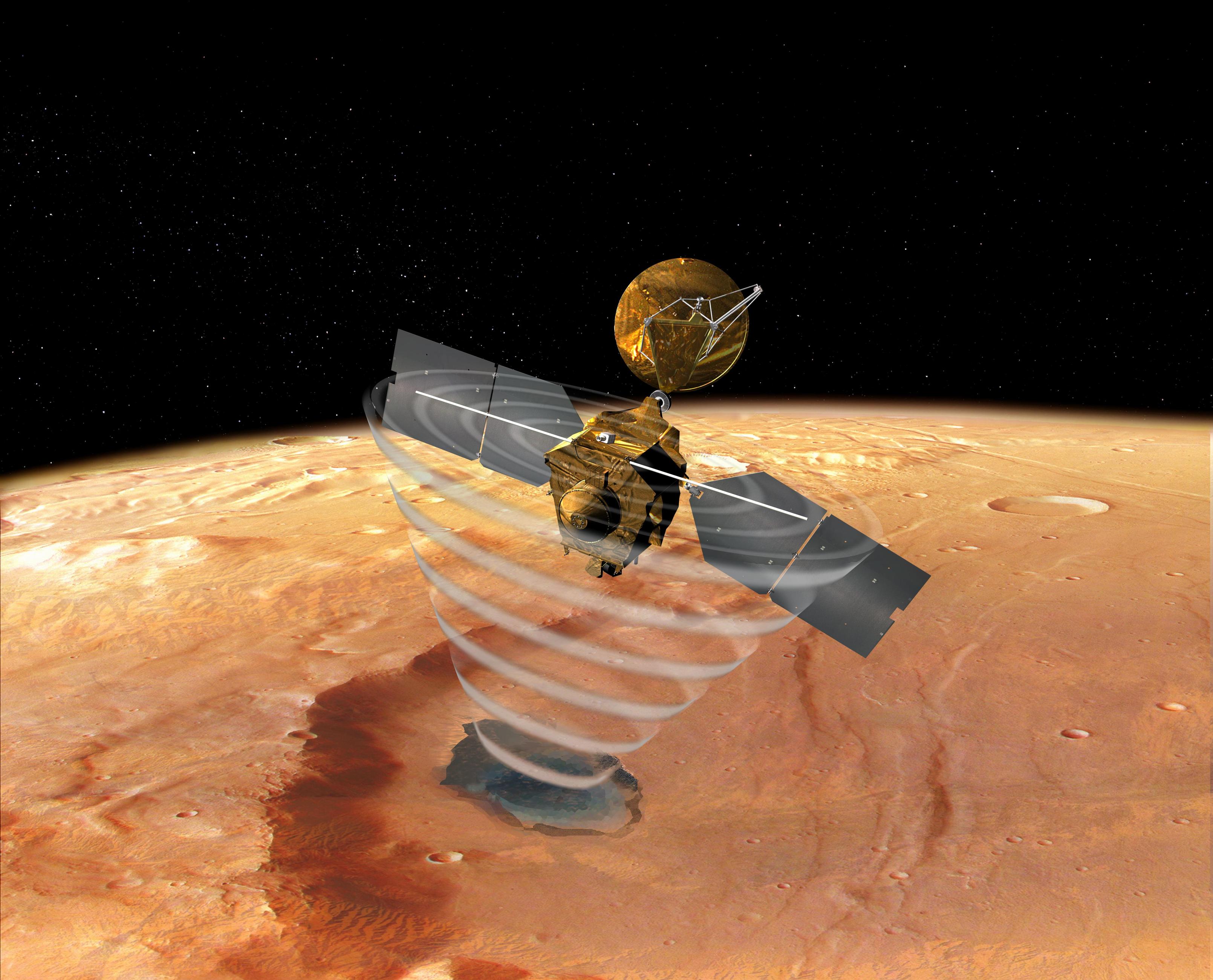 This image is an artist's concept of a view looking down on NASA's Mars Reconnaissance Orbiter. The spacecraft is pictured using its Shallow Subsurface Radar instrument (SHARAD) to "look" under the surface of Mars.