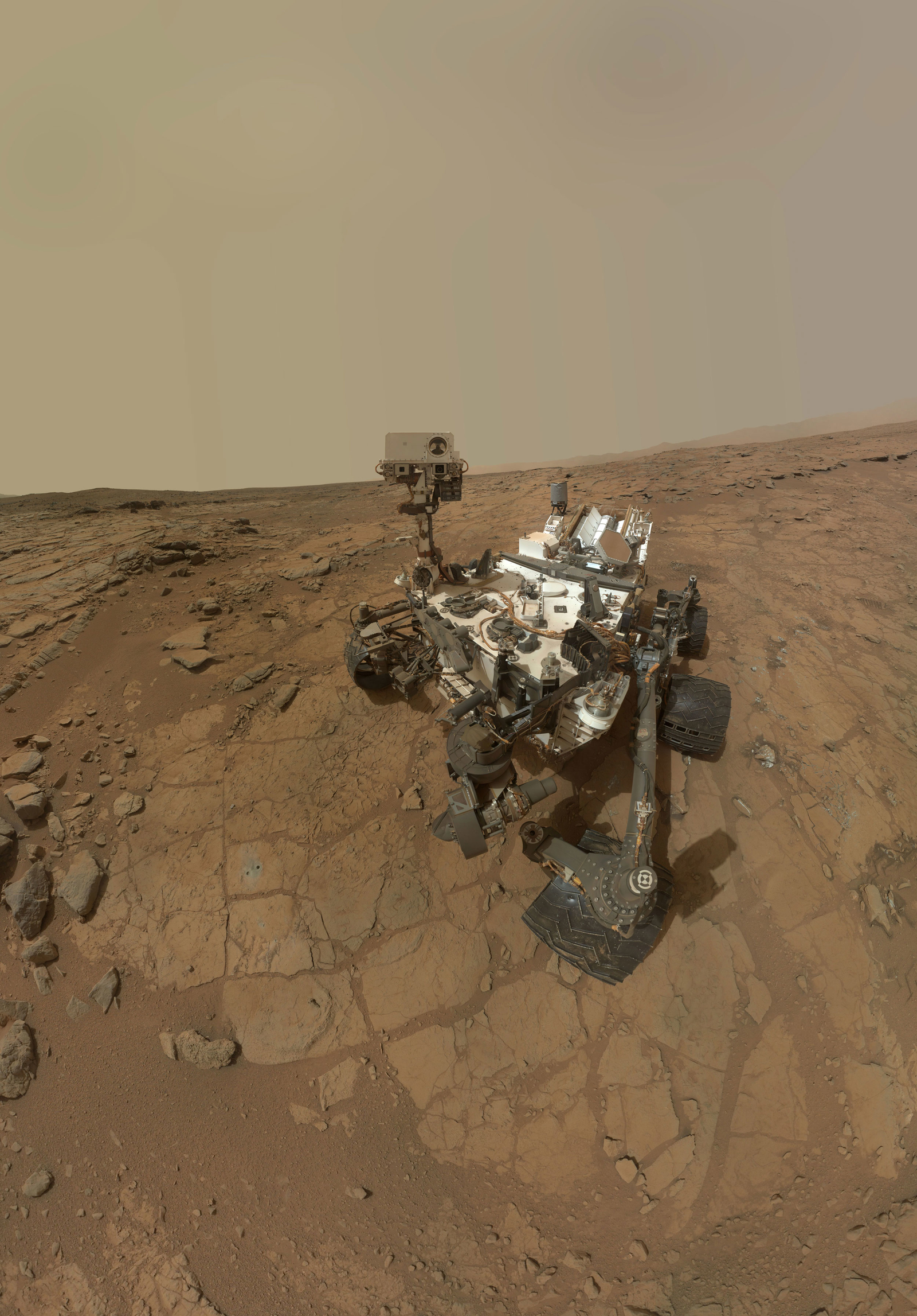 This self-portrait of NASA's Mars rover Curiosity combines dozens of exposures taken by the rover's Mars Hand Lens Imager (MAHLI) during the 177th Martian day, or sol, of Curiosity's work on Mars (Feb. 3, 2013), plus three exposures taken during Sol 270 (May 10, 2013) to update the appearance of part of the ground beside the rover.