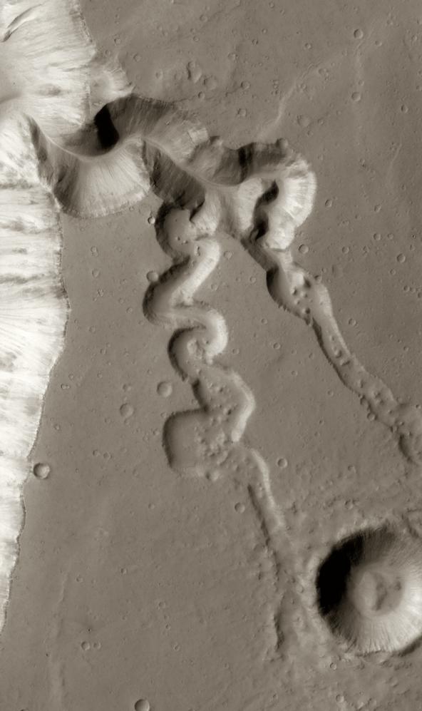 This image shows two small tributaries, just east of where they join Shalbatana Vallis.