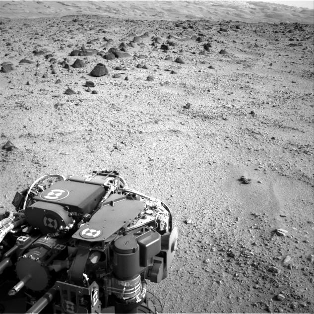 Mars rover Curiosity at the end of a drive of about 135 feet (41 meters) during the 329th Martian day, or sol, of the rover's work on Mars (July 9, 2013).