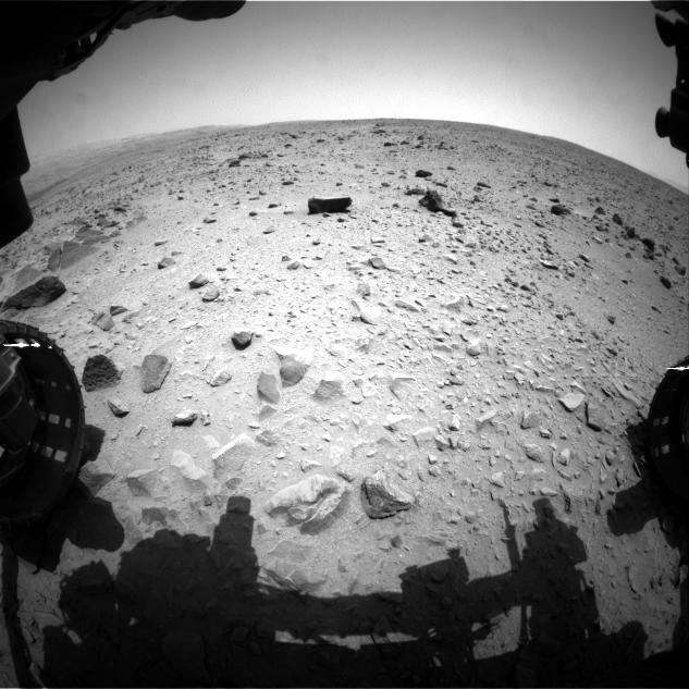 NASA's Curiosity Mars rover captured this image with its left front Hazard-Avoidance Camera (Hazcam) just after completing a drive that took the mission's total driving distance past the 1 kilometer (0.62 mile) mark.