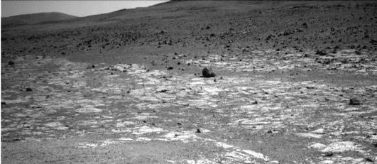 This view from NASA's Mars Exploration Rover Opportunity shows an area where a pale-toned geological unit called the "Burns Foundation," in the foreground, abuts a different geological unit.