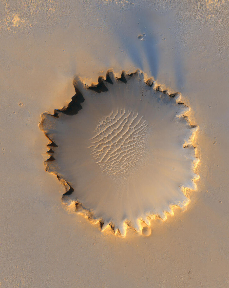 "Victoria Crater," about 800 meters (one-half mile) in diameter, has been home ground for NASA's Mars Exploration Rover Opportunity for more 14 of the rover's first 46 months on Mars.