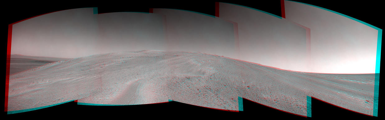 NASA's Mars Exploration Rover Opportunity captured this stereo view after beginning to ascend the northwestern slope of "Solander Point" on the western rim of Endeavour Crater.