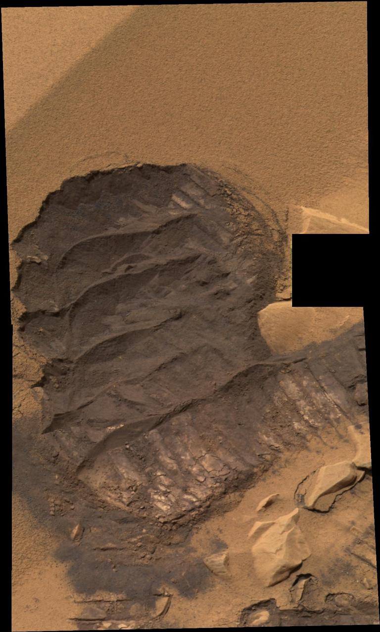 This is a "scuff" mark or rover "boot print" in the Gusev Crater location dubbed "Serpent."