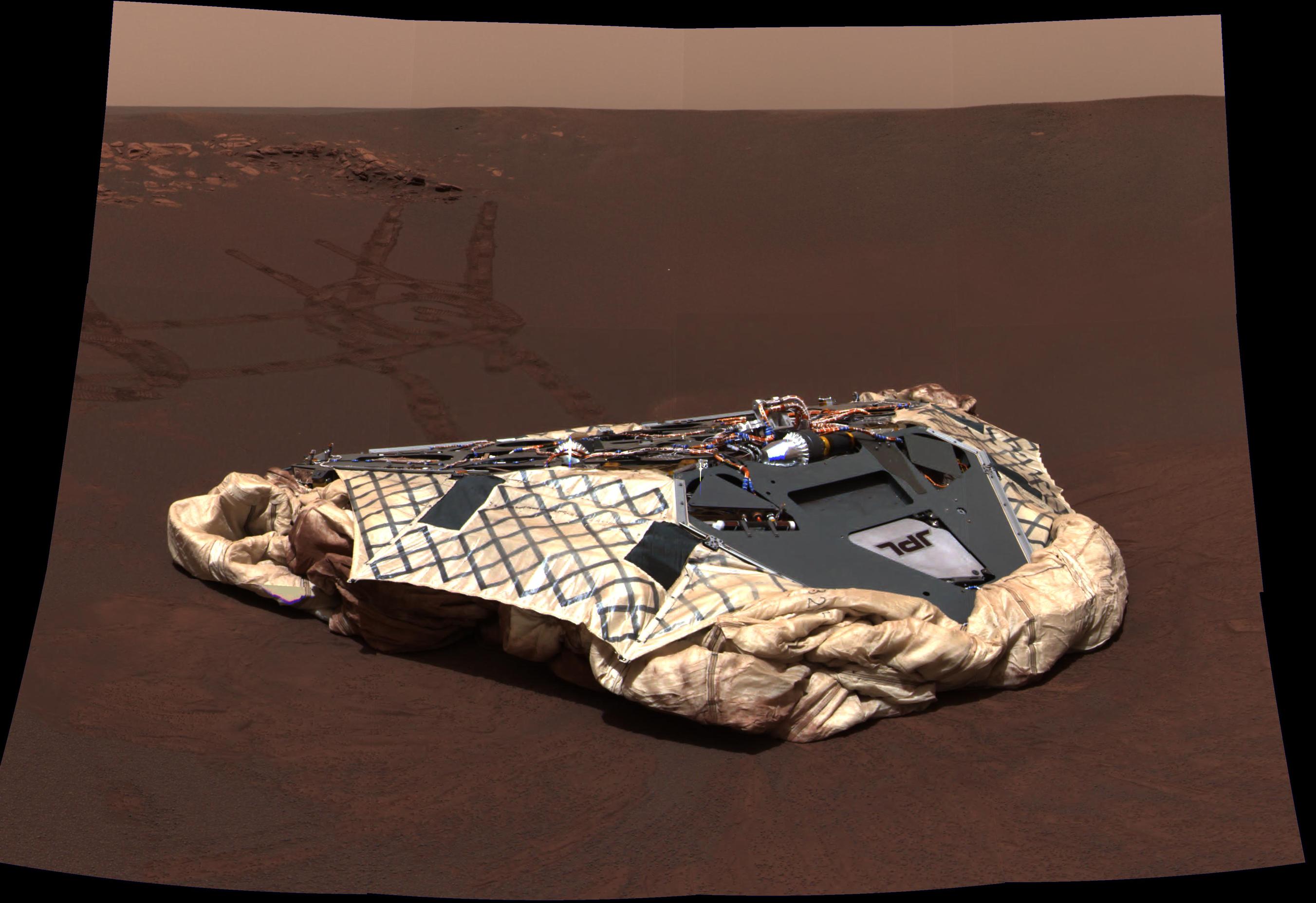 This image taken by the panoramic camera onboard Opportunity shows the rover's now-empty lander, the Challenger Memorial Station, at Meridiani Planum, Mars.