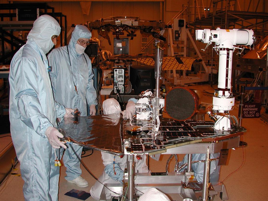 Engineers for NASA's Mars Exploration Rover Mission are completing assembly and testing for the twin robotic geologists at JPL. This