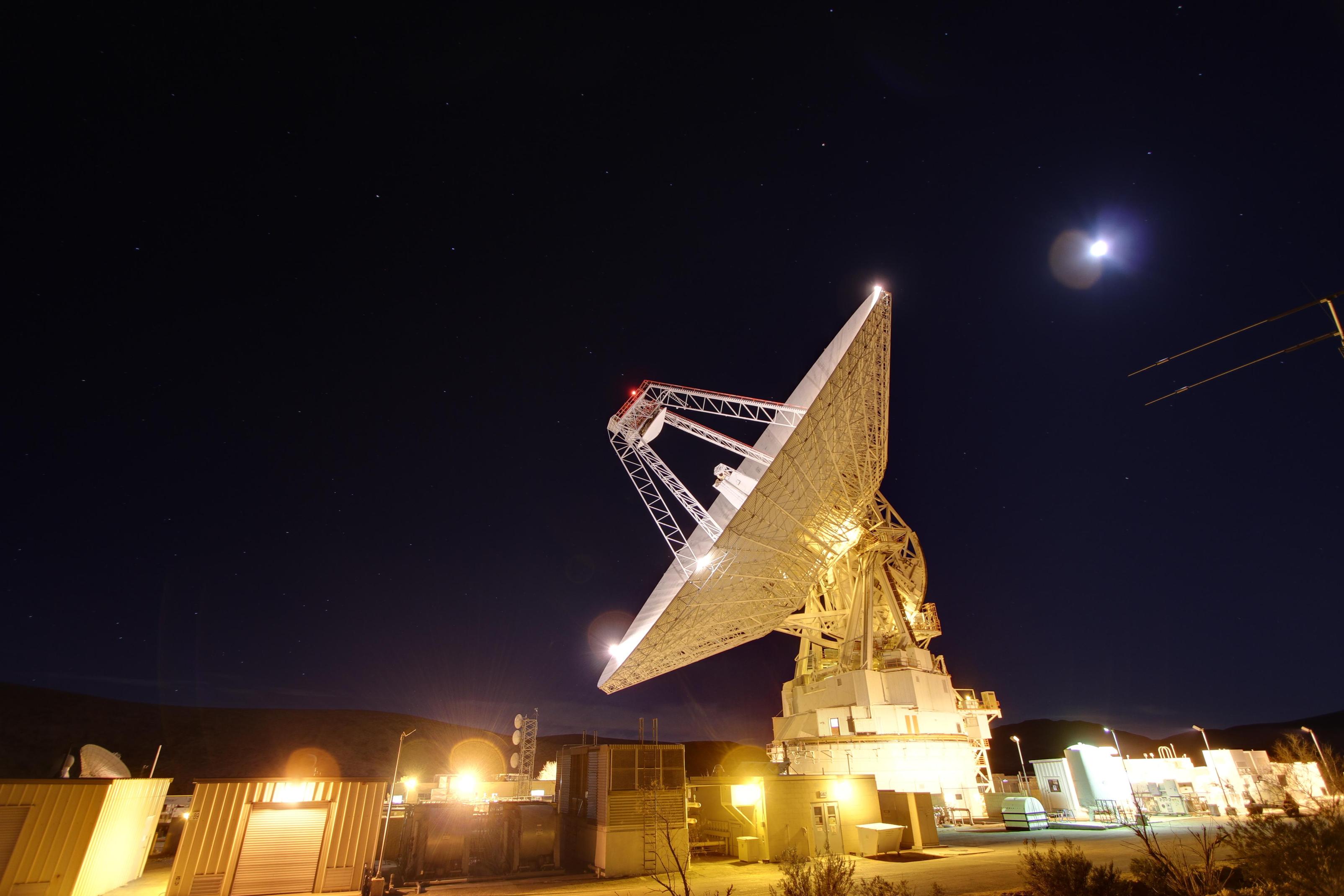 Late night in the desert: Goldstone's 230-foot (70-meter) antenna tracks spacecraft day and night. This photograph was taken on Jan. 11, 2012.