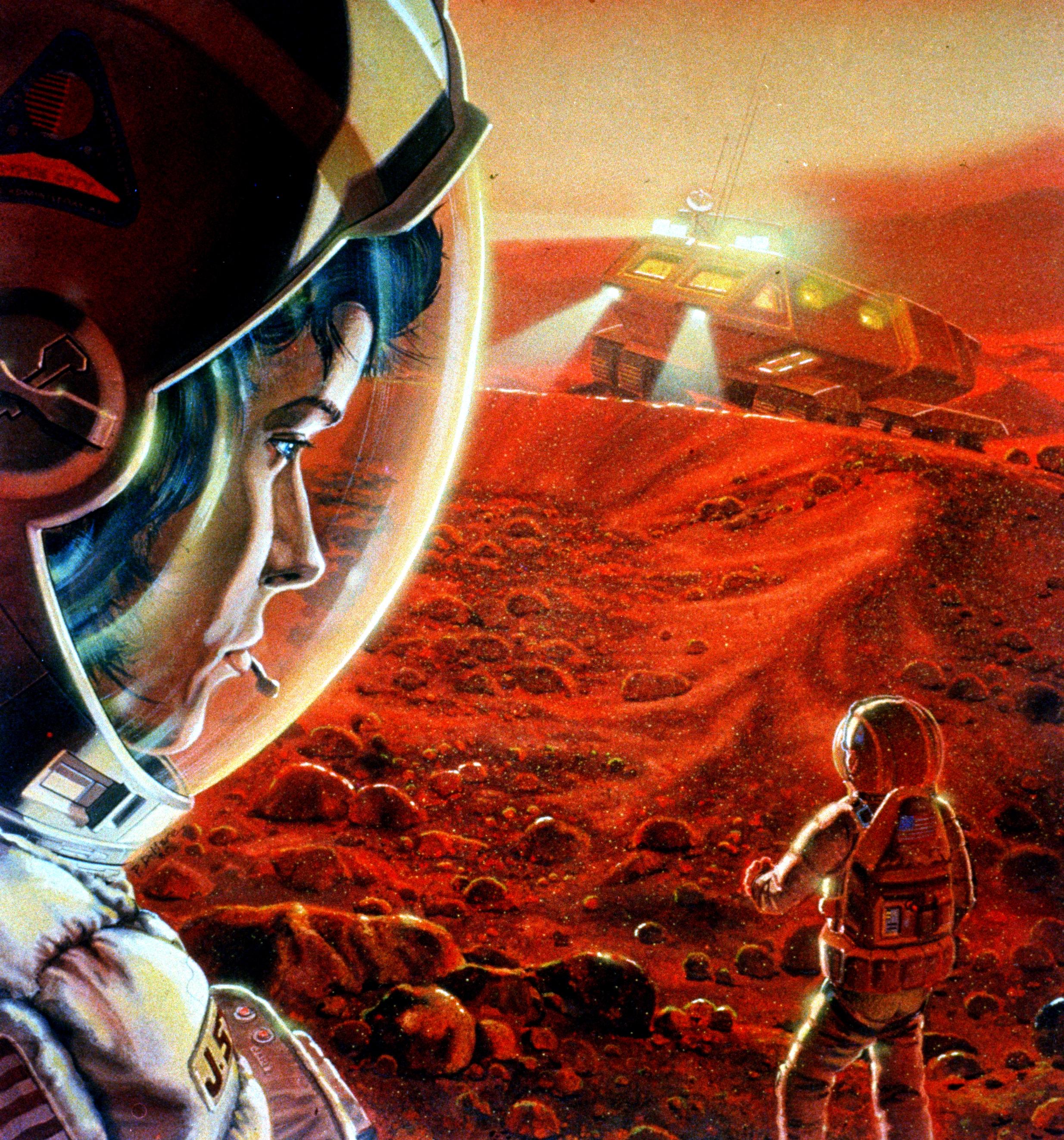 In this artist's concept, an astronaut in the foreground looks back at a fellow astronaut.  Behind them both is a vehicle with its headlights beaming.