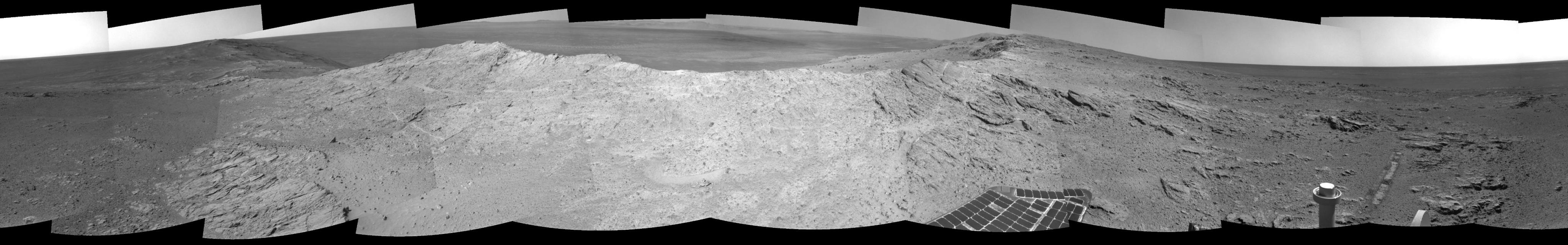 NASA's Mars Exploration Rover Opportunity used its navigation camera on May 10, 2014, to capture this 360-degree view near the ridgeline of Endeavour Crater's western rim. The center is southeastward. Rocks on the slope to the right of center are in an outcrop area targeted for the rover to study.