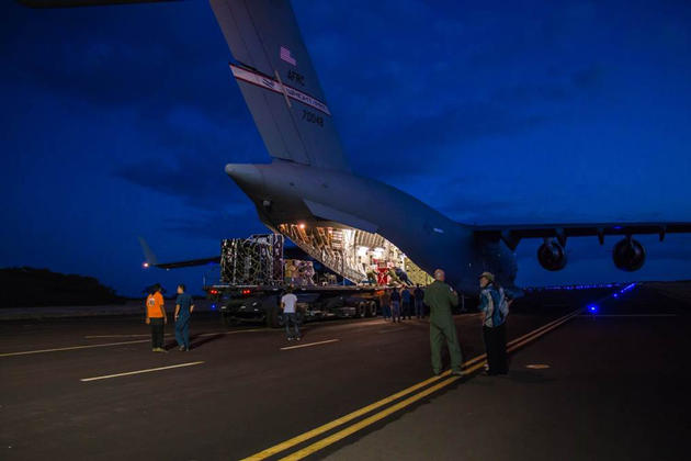 Engineers unload ground support equipment for a June engineering test flight above Kauai, Hawaii.