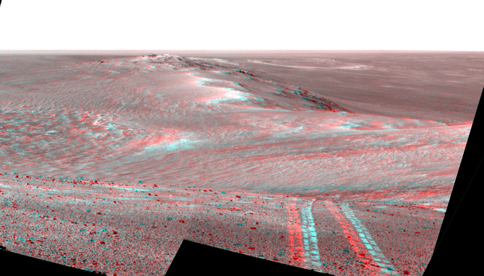 This scene from the panoramic camera (Pancam) on NASA's Mars Exploration Rover Opportunity looks back toward part of the west rim of Endeavour Crater that the rover drove along, heading southward, during the summer of 2014.