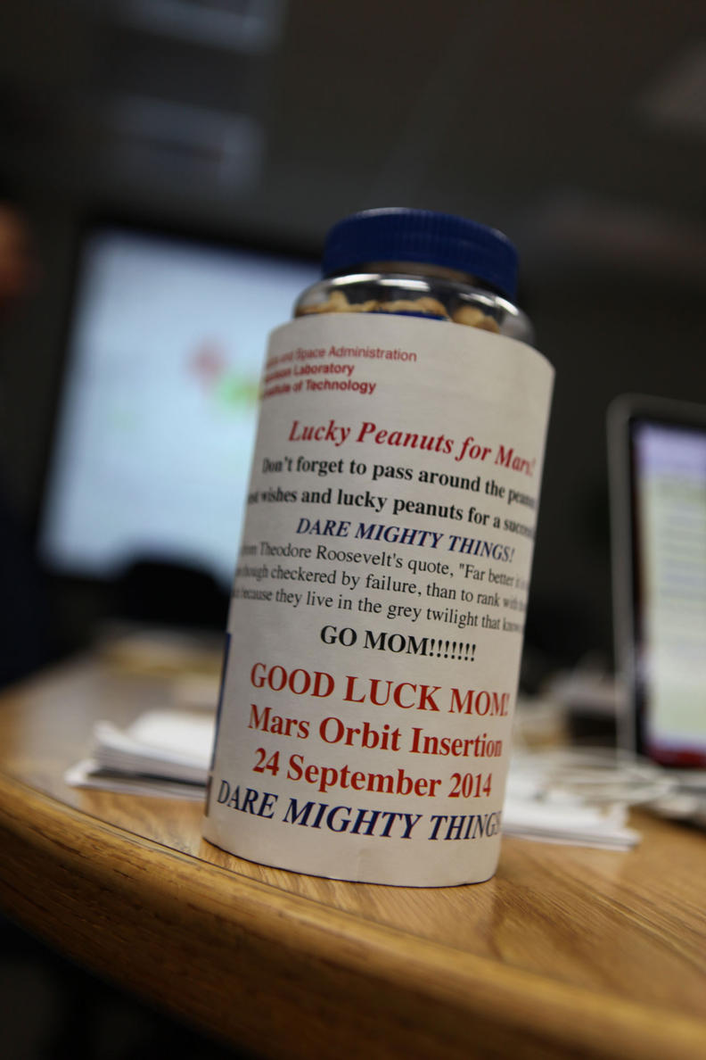 A jar of lucky peanuts to wish India's Mars Orbiter Mission success in its Mars Orbit Insertion says "Dare Mighty Things."