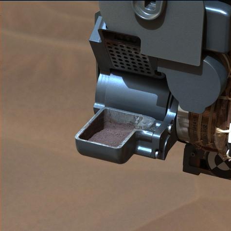 This image from NASA's Curiosity rover shows a sample of powdered rock extracted by the rover's drill from the "Confidence Hills" target -- the first rock drilled after Curiosity reached the base of Mount Sharp in September 2014.