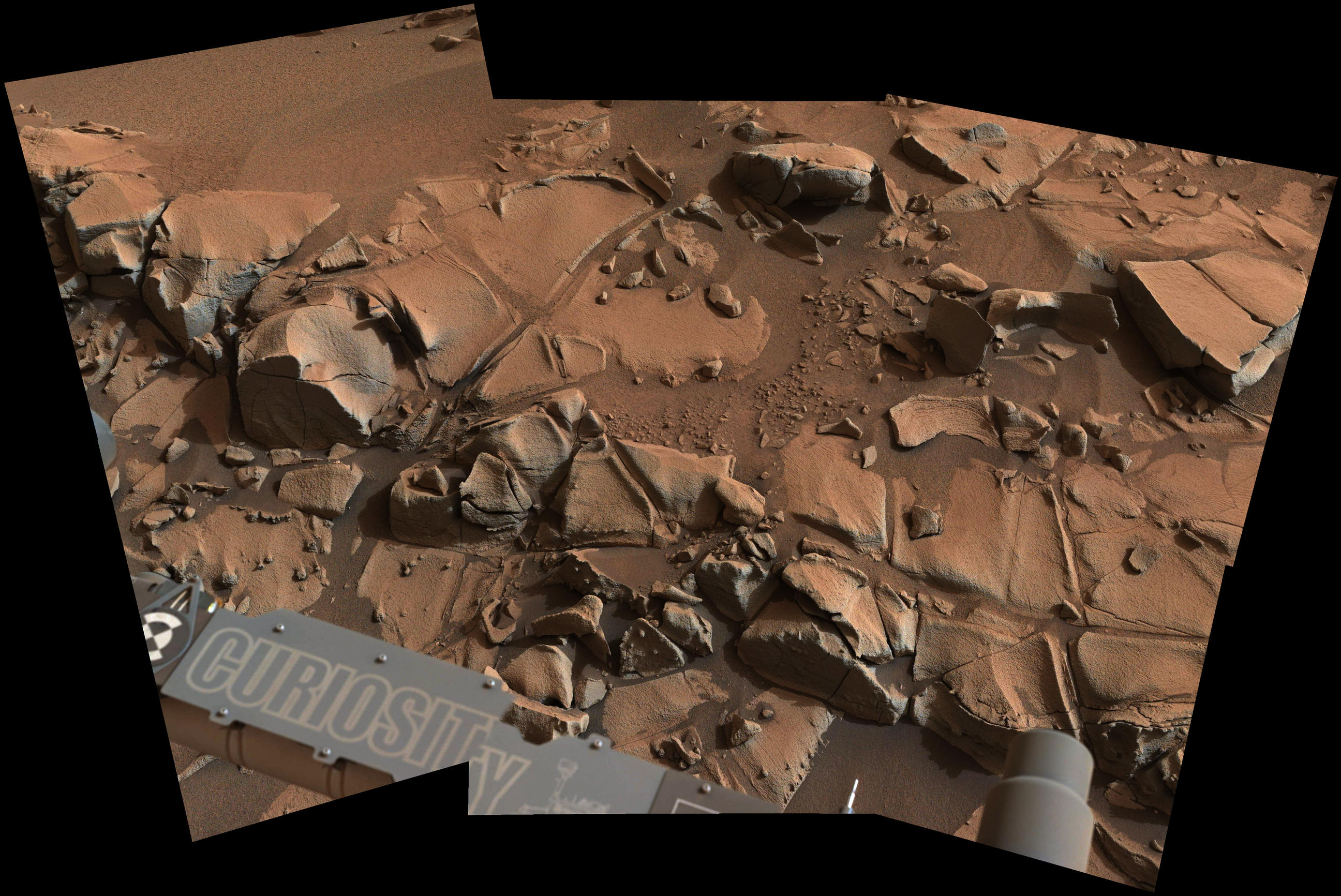 This view from the Mast Camera (Mastcam) on NASA's Curiosity Mars rover shows a swath of bedrock called "Alexander Hills," which the rover approached for close-up inspection of selected targets. It is a mosaic of six frames taken on Nov. 23, 2014.