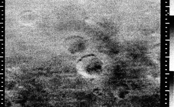This image is the 8th taken by Mariner 4 showing craters.