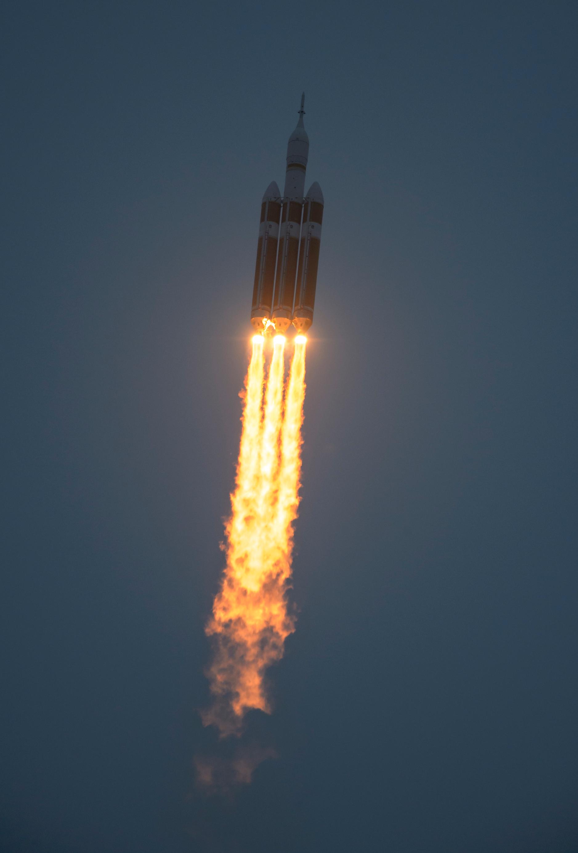 The United Launch Alliance Delta IV Heavy rocket with NASA's Orion spacecraft mounted atop, lifts off from Cape Canaveral Air Force Station's Space Launch Complex 37 at at 7:05 a.m. EST, Friday, Dec. 5, 2014, in Florida.