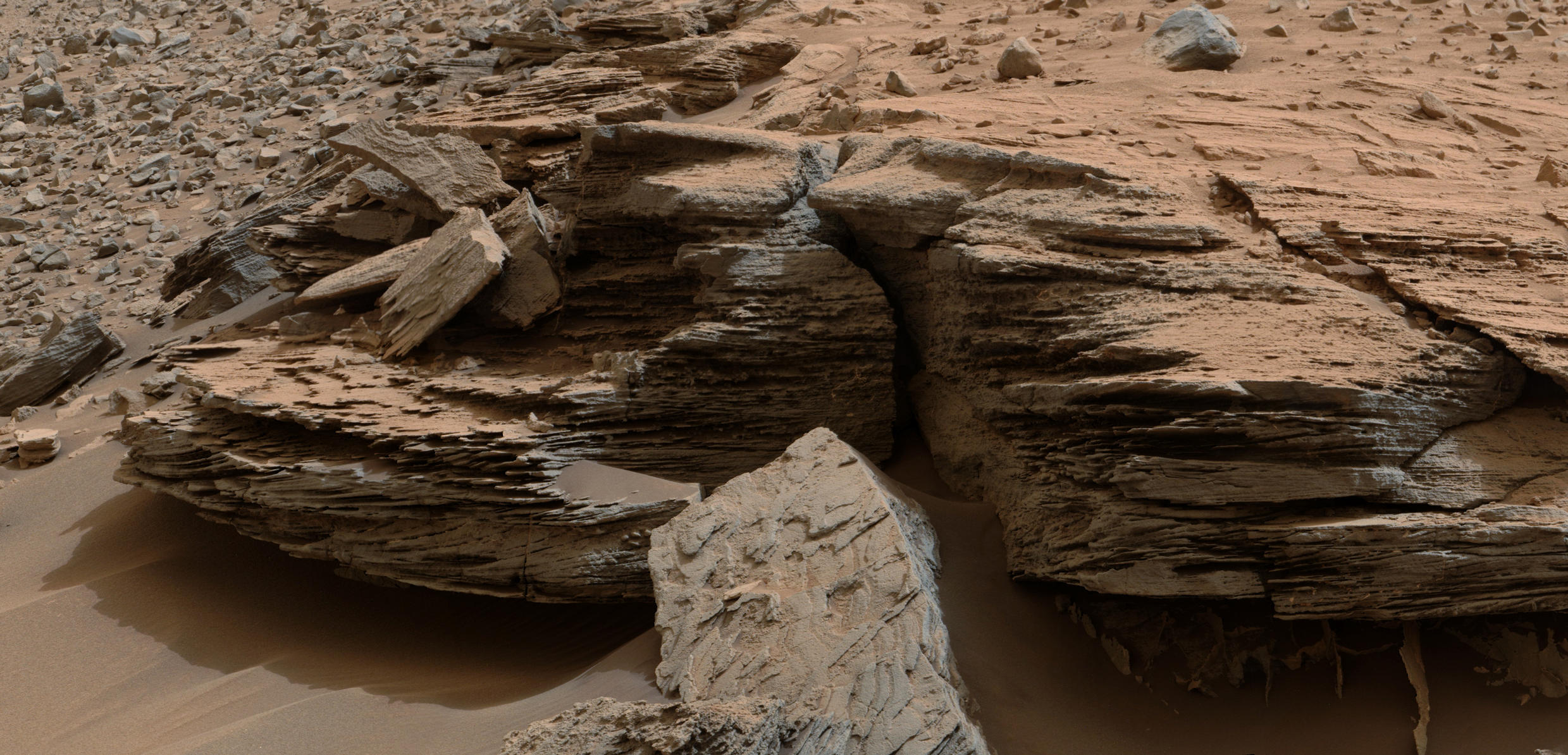 This view from the Mastcam on NASA's Curiosity Mars rover shows an example of cross-bedding that results from water  passing over a loose bed of sediment. It was taken Nov. 2, 2014, at a target called "Whale Rock" within the "Pahrump Hills" outcrop at the base of Mount Sharp.