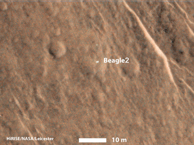This annotated image from NASA's Mars Reconnaissance Orbiter shows a bright feature interpreted as the United Kingdom's Beagle 2 Lander, which was never heard from after its expected Dec. 25, 2003, landing.