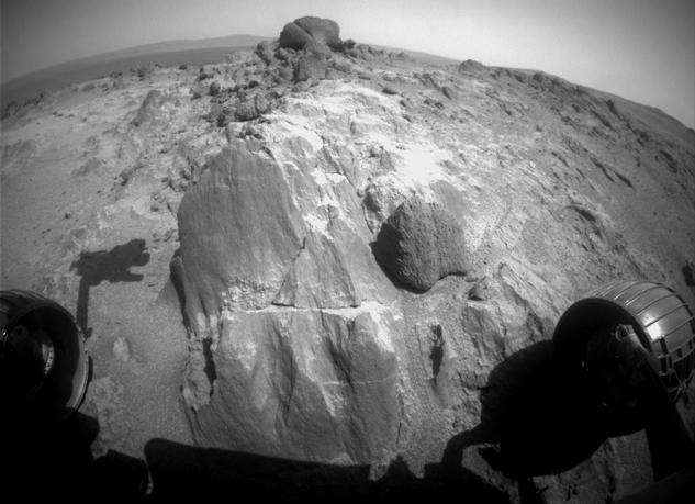 The flat-faced rock near the center of this image is a target for contact investigation by NASA's Mars Exploration Rover Opportunity in early March 2015.