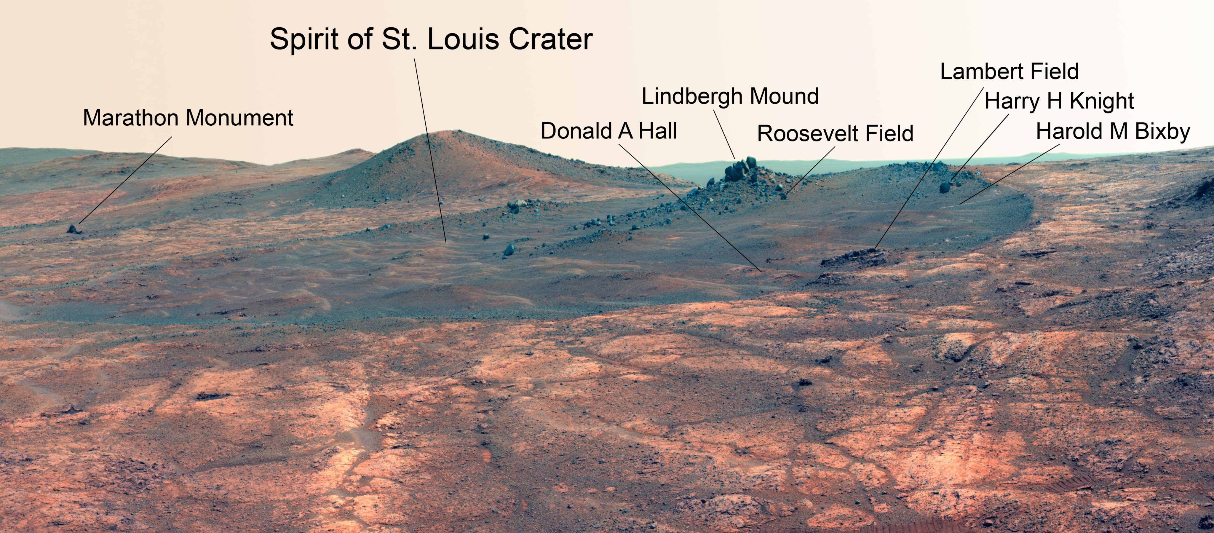 Names related to the first solo nonstop flight across the Atlantic have been informally assigned to a crater NASA's Opportunity Mars rover is studying. This false-color view of the "Spirit of St. Louis Crater" and the "Lindbergh Mound" inside it comes from Opportunity's panoramic camera.
