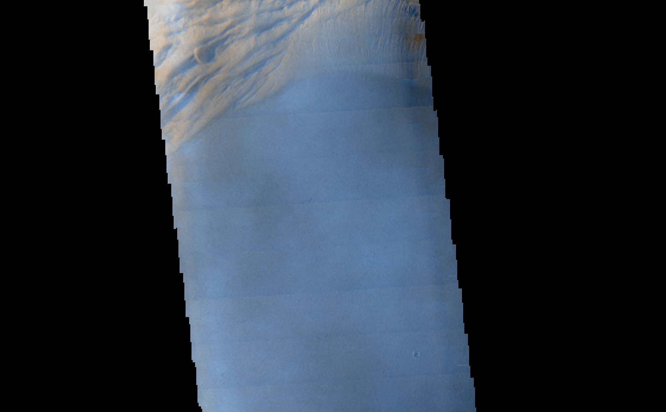 Seen shortly after local Martian sunrise, clouds gather in the summit pit, or caldera, of Arsia Mons, a giant volcano on Mars, in this image from the Thermal Emission Imaging System (THEMIS) on NASA's Mars Odyssey orbiter.