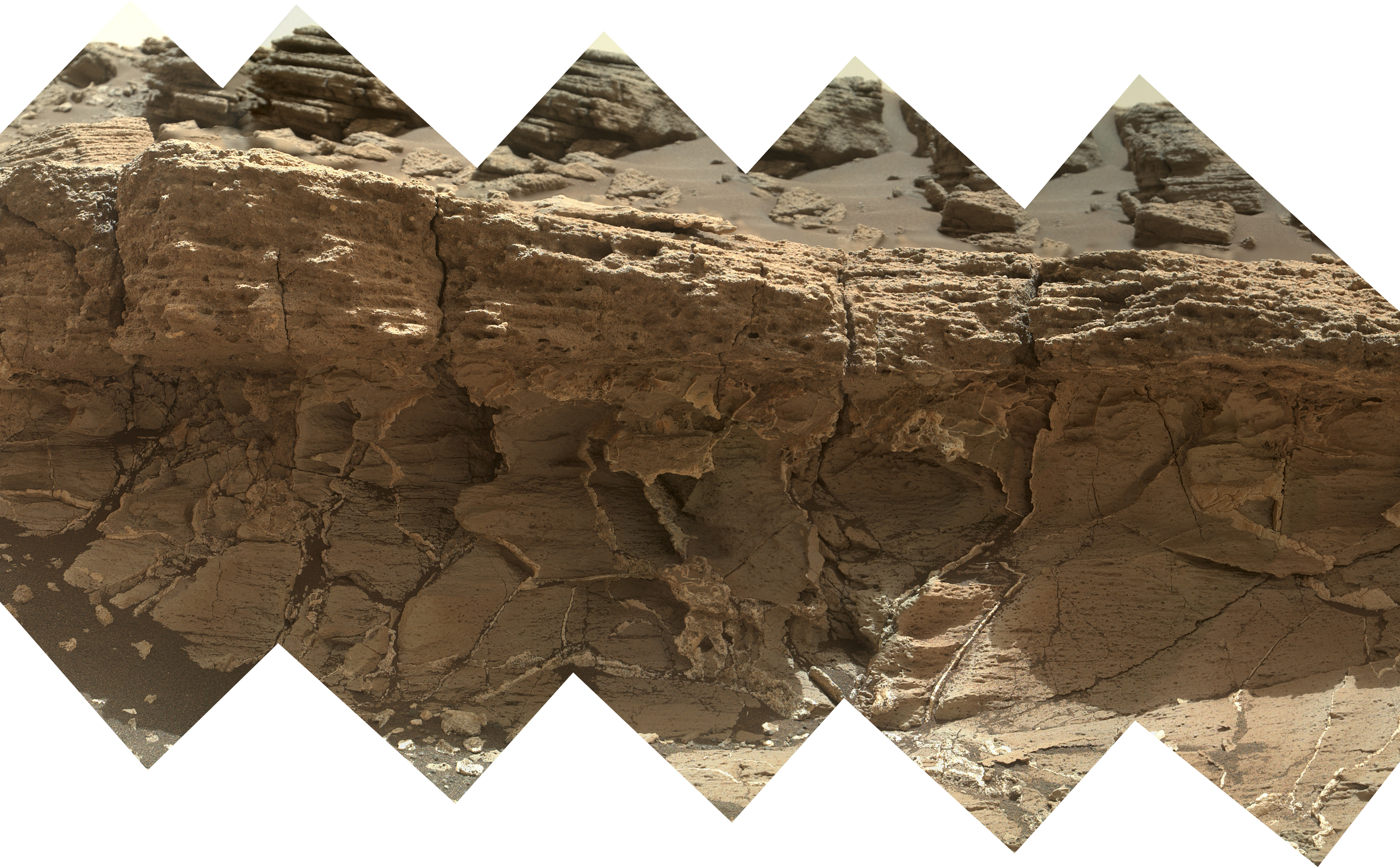 A rock outcrop dubbed "Missoula," near Marias Pass on Mars, is seen in this image mosaic taken by the Mars Hand Lens Imager on NASA's Curiosity rover.