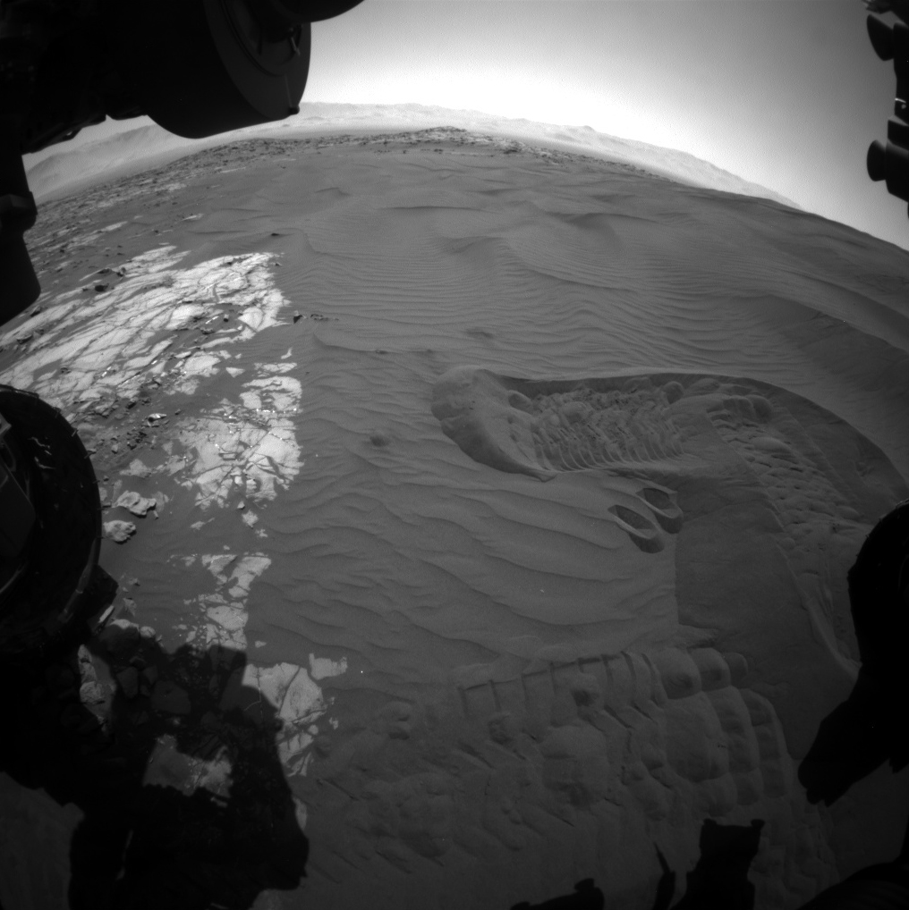 This view captures Curiosity's current work area where the rover continues its campaign to study an active sand dune on Mars.
