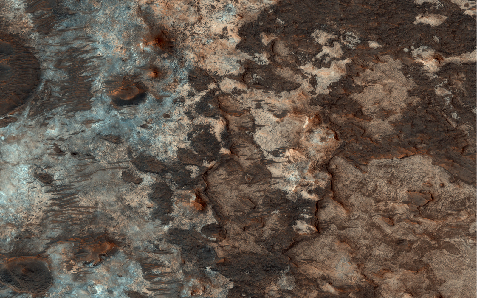Mawrth Vallis has a rich mineral diversity, including clay minerals that formed by the chemical alteration of rocks or loose "regolith" (soil) by water.