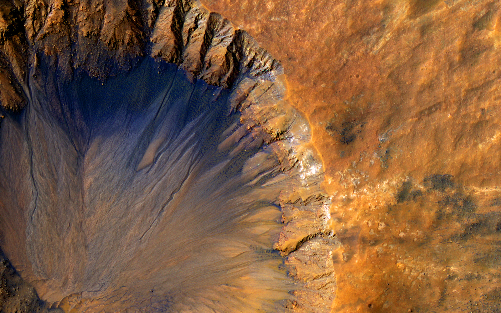 A crater in the ground on Mars