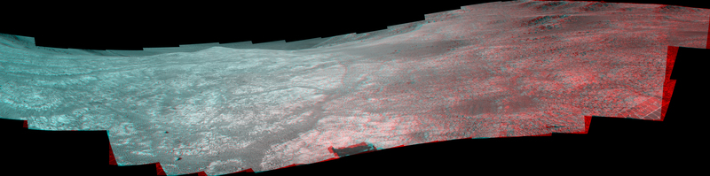"Marathon Valley" on Mars opens northeastward in this stereo version of a scene from the Pancam of NASA's Mars Exploration Rover Opportunity. The scene, recorded in April and May 2016, appears three-dimensional when seen through blue-red glasses with the red lens on the left.