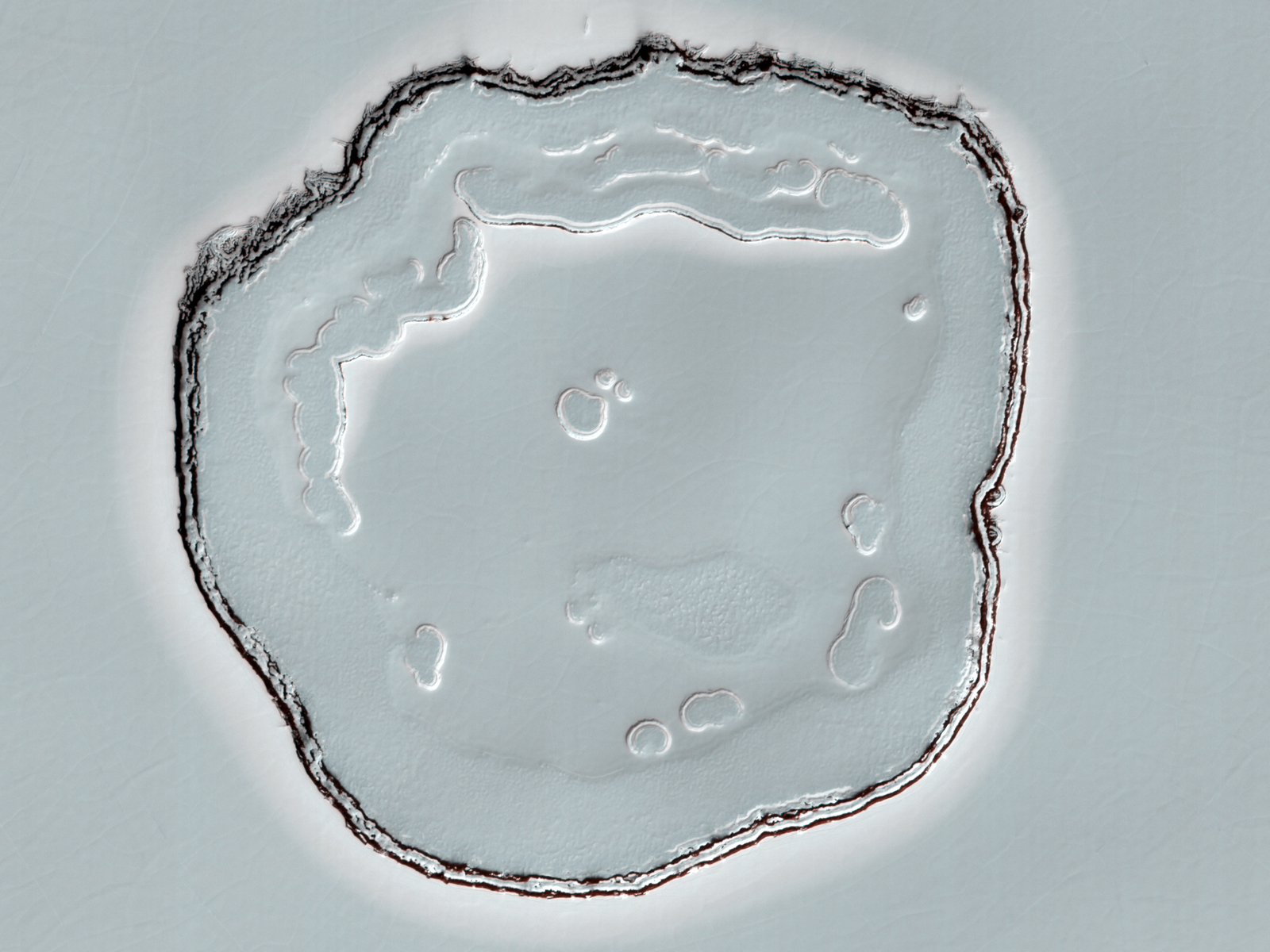Dry ice causes "Swiss Cheese" terrain on Mars.