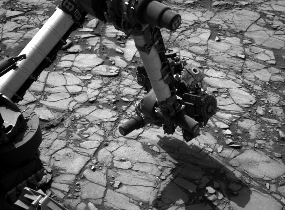 NASA's Curiosity Mars rover began close-up investigation of a target called "Marimba," on lower Mount Sharp, during the week preceding the fourth anniversary of the mission's Aug. 6, 2016, landing. Curiosity's Navigation Camera took this shot of the rover's arm over Marimba on Aug. 2, 2016.