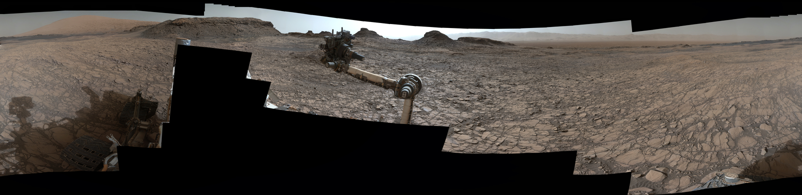 This 360-degree vista was acquired on Aug. 5, 2016, by the Mastcam on NASA's Curiosity Mars rover as the rover neared features called "Murray Buttes" on lower Mount Sharp. The dark, flat-topped mesa seen to the left of the rover's arm is about 50 feet high and, near the top, about 200 feet wide.