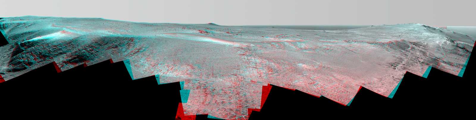 A grooved ridge called "Rocheport" on the rim of Mars' Endeavour Crater spans this stereo scene from NASA's Mars rover Opportunity. The view combines images from left eye and right eye of the rover's Pancam to appear three-dimensional when seen through blue-red glasses with the red lens on the left.