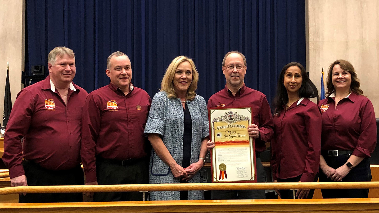 L.A. County Supervisor Kathryn Barger (center) presented the proclamation to the InSight team, represented by (left to right) Chuck Scott, Tom Hoffman, Bruce Banerdt, Pilar Leon and Christine Szalai.