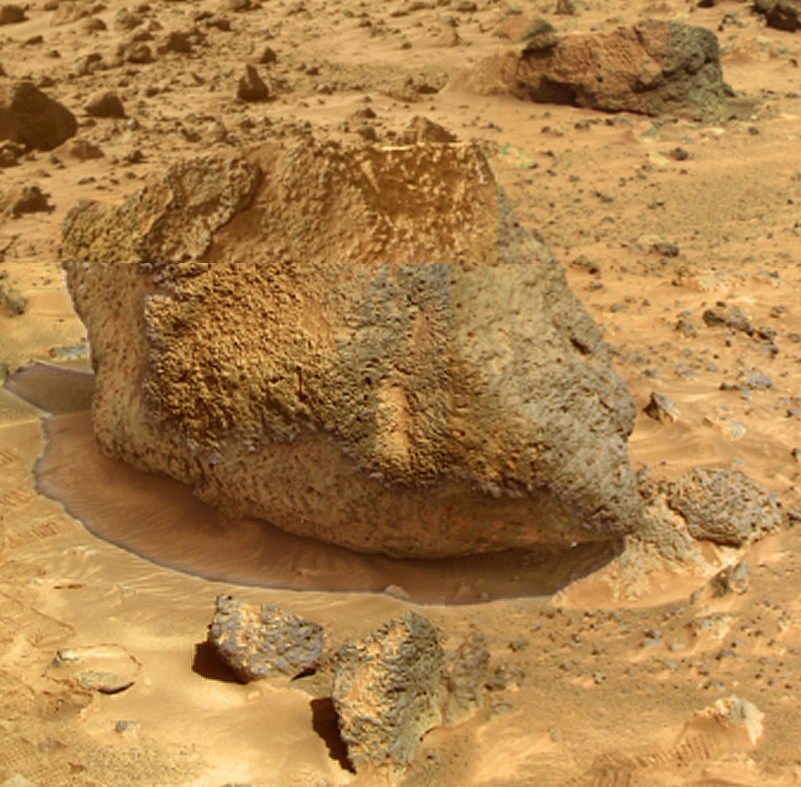 Yogi' is a meter-size rock about 5 meters northwest of NASA's Mars Pathfinder lander and was the second rock visited by the Sojourner Rover's alpha proton X-ray spectrometer (APXS) instrument. Sol 1 began on July 4, 1997.
